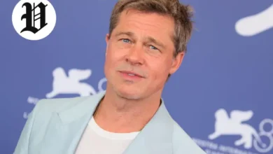 Brad Pitt posing at Venice Film Festival