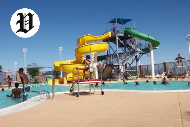 Outdoor pool and water slides at Desert Breeze Park Aquatic Center