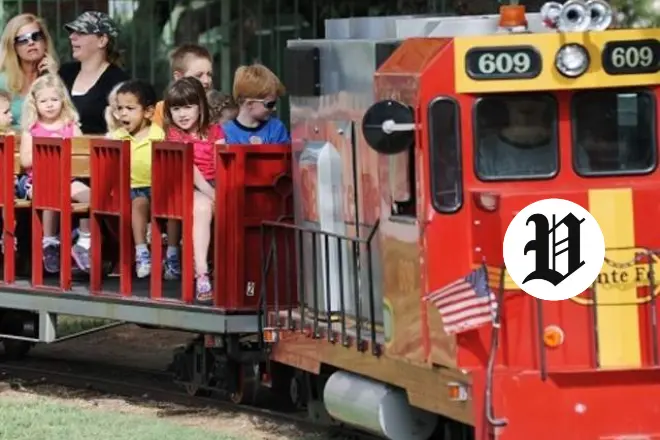 Children riding the Desert Breeze Park train ride in Las Vegas