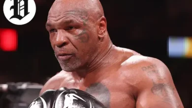 Mike Tyson Biography – Mike Tyson training in later years with boxing gloves