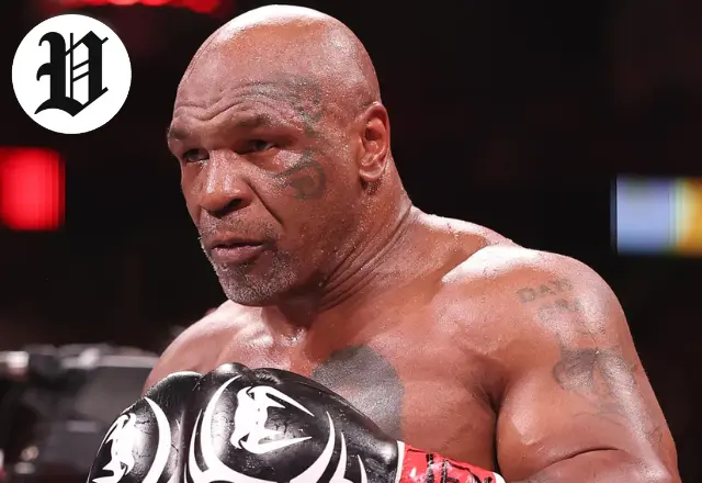 Mike Tyson Biography – Mike Tyson training in later years with boxing gloves