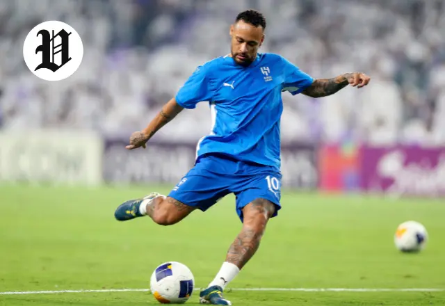 Neymar Jr training session in blue kit, striking the ball on the field