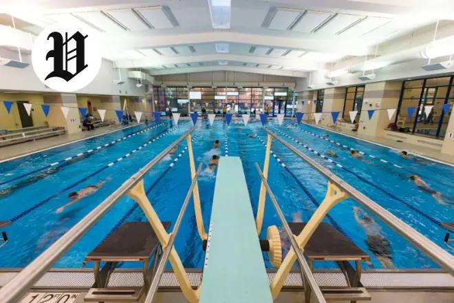 Pavilion Georgetown indoor swimming pool with diving board and lap lanes.