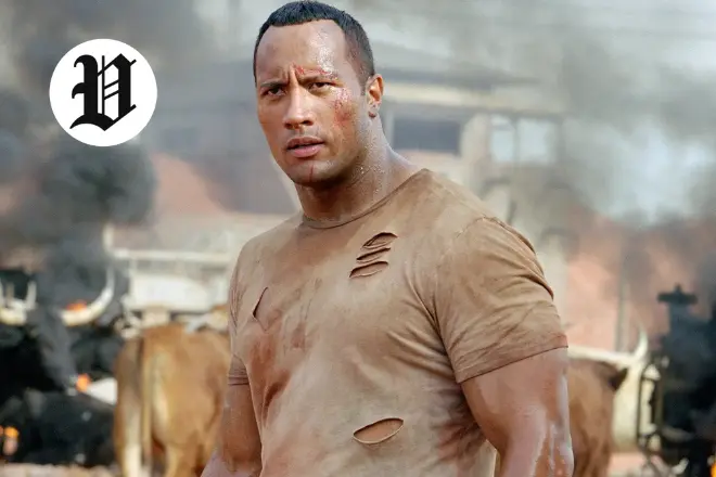The Rock in an action movie scene with dirt and torn shirt