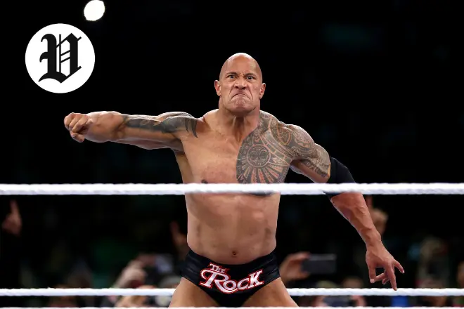 The Rock in WWE wrestling ring showing his iconic pose