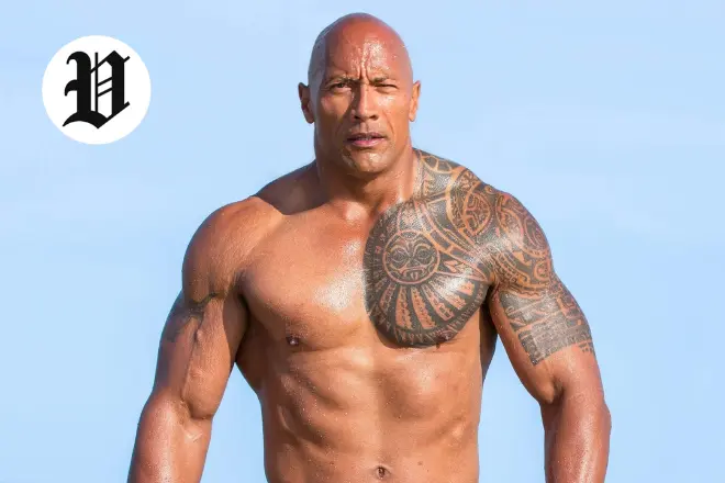The Rock showing muscular physique on the beach