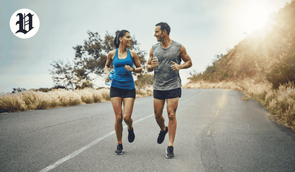 Man and woman stretching outdoors in activewear, promoting fitness, health, and an energetic lifestyle.