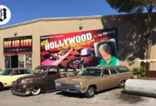 Exterior view of the Hollywood Car Museum in Las Vegas with classic cars parked outside.