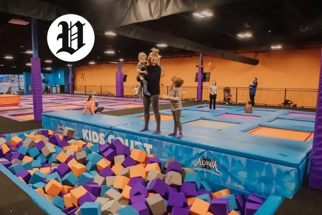 Family enjoying an indoor play place with trampolines and foam pit in Las Vegas.