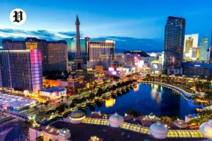 Las Vegas Tourist Attractions Bellagio fountains and Paris Hotel skyline.