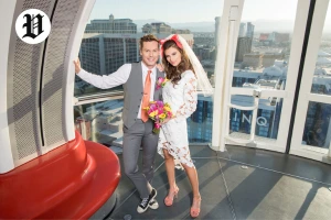Newlywed couple posing inside the High Roller observation wheel – Married in Las Vegas