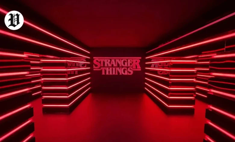 Stranger Things in Las Vegas red neon tunnel entrance with glowing logo
