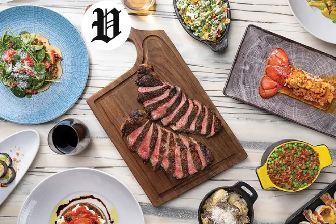 Steak and shared dishes at Top of the World Las Vegas restaurant.