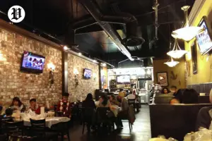Cozy unique restaurants in Las Vegas with brick walls and warm lighting