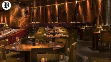 Modern fine dining interior at a unique restaurant in Las Vegas with warm wood décor