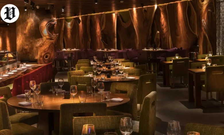 Modern fine dining interior at a unique restaurant in Las Vegas with warm wood décor