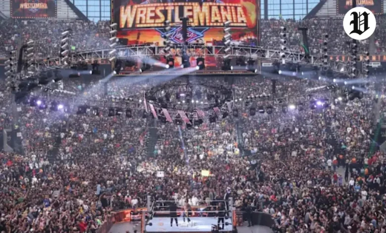 WrestleMania Las Vegas ring and massive entrance stage under stadium roof, surrounded by fans